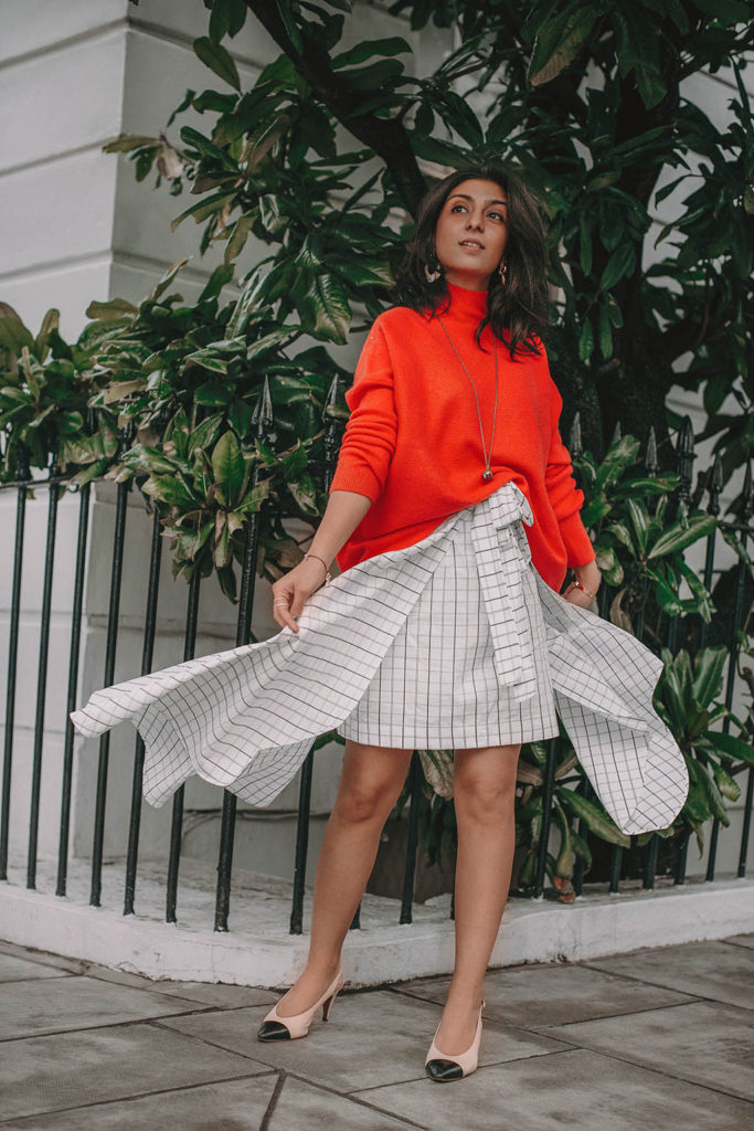 Fashion blogger Shloka Narang of The Silk Sneaker shares how to create the perfect spring outfit while styling an asymmetrical skirt featuring Deme by Gabriella, Chanel and Amazon Fashion