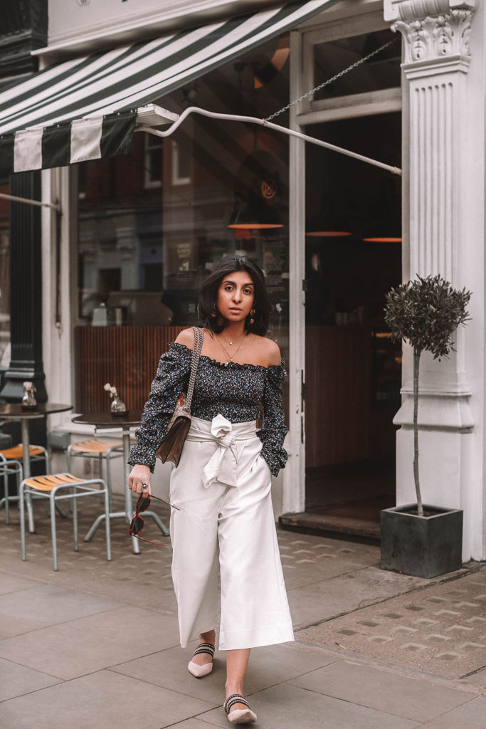 Fashion blogger Shloka Narang of The Silk Sneaker shares her tips on how to style a floral blouse for any spring or summer outfit featuring Topshop and Gucci