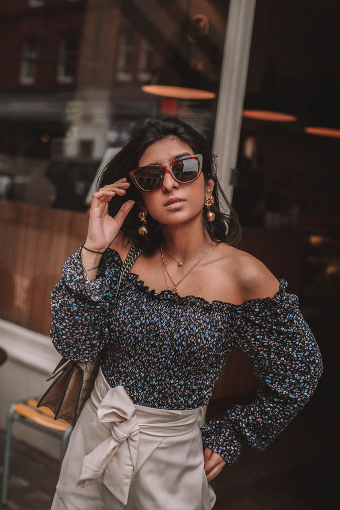 Fashion blogger Shloka Narang of The Silk Sneaker shares her tips on how to style a floral blouse for any spring or summer outfit featuring Topshop and Gucci