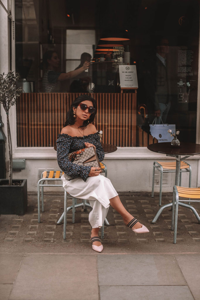Fashion blogger Shloka Narang of The Silk Sneaker shares her tips on how to style a floral blouse for any spring or summer outfit featuring Topshop and Gucci