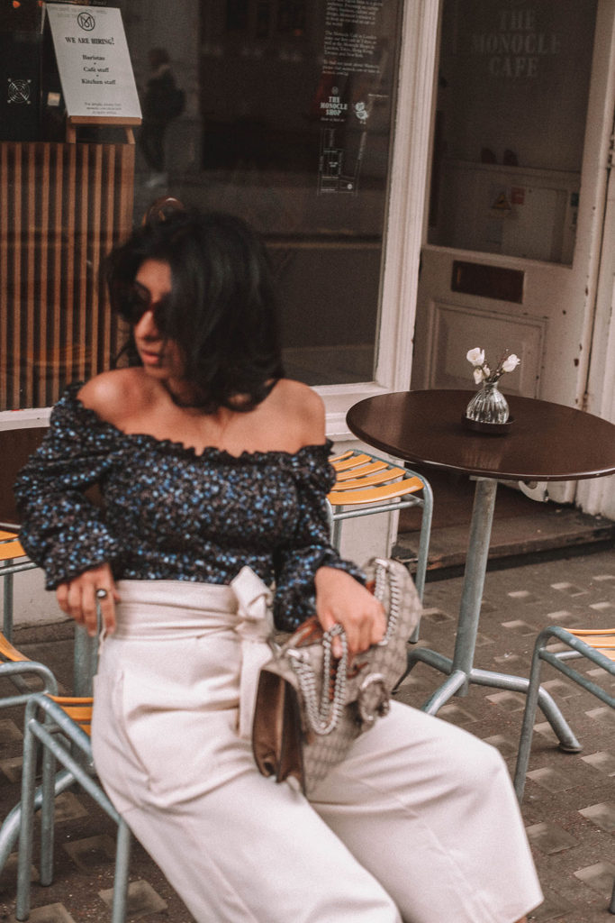 Fashion blogger Shloka Narang of The Silk Sneaker shares her tips on how to style a floral blouse for any spring or summer outfit featuring Topshop and Gucci