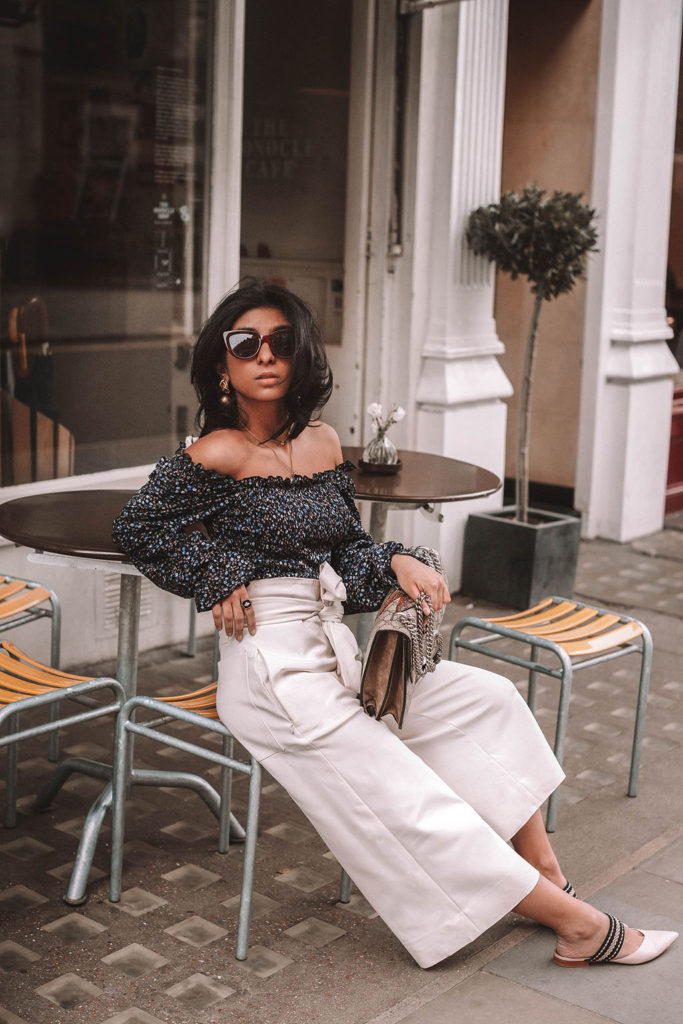 Fashion blogger Shloka Narang of The Silk Sneaker shares her tips on how to style a floral blouse for any spring or summer outfit featuring Topshop and Gucci