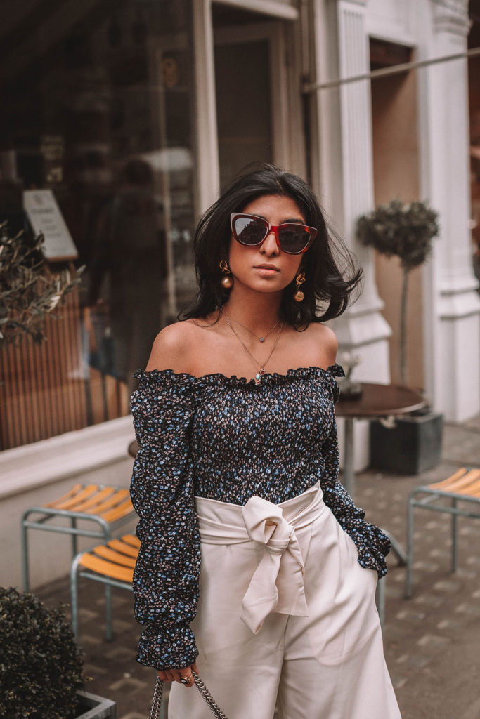 Fashion blogger Shloka Narang of The Silk Sneaker shares her tips on how to style a floral blouse for any spring or summer outfit featuring Topshop and Gucci