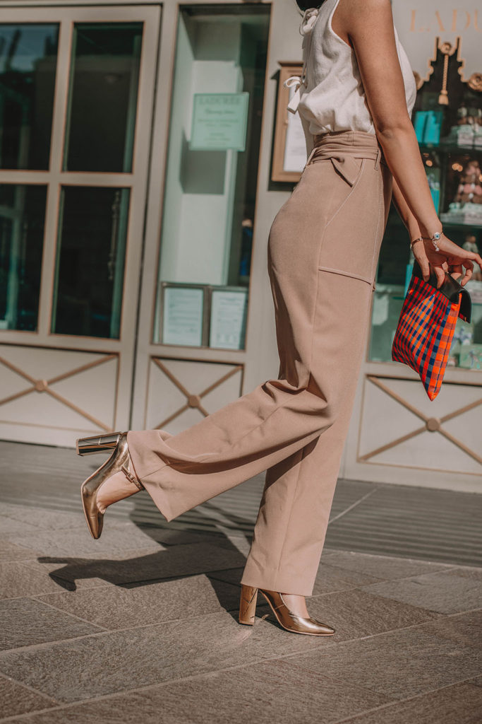 Fashion blogger Shloka Narang of The Silk Sneaker shares her take on a chic office outfit for always looking stylish at work featuring Maje, Topshop and Jimmy Choo