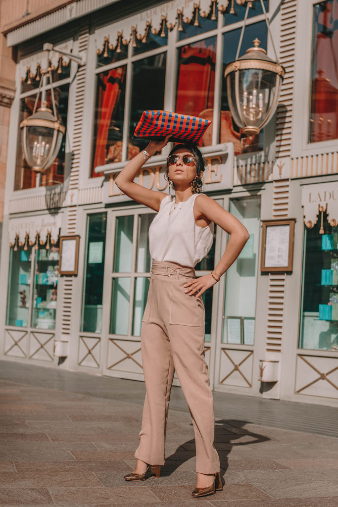 Fashion blogger Shloka Narang of The Silk Sneaker shares her take on a chic office outfit for always looking stylish at work featuring Maje, Topshop and Jimmy Choo