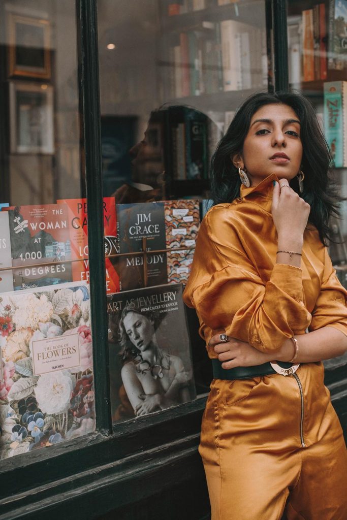 Fashion blogger Shloka Narang of The Silk Sneaker shares how to wear a jumpsuit for a casual summer outfit featuring Celine and Valentino.