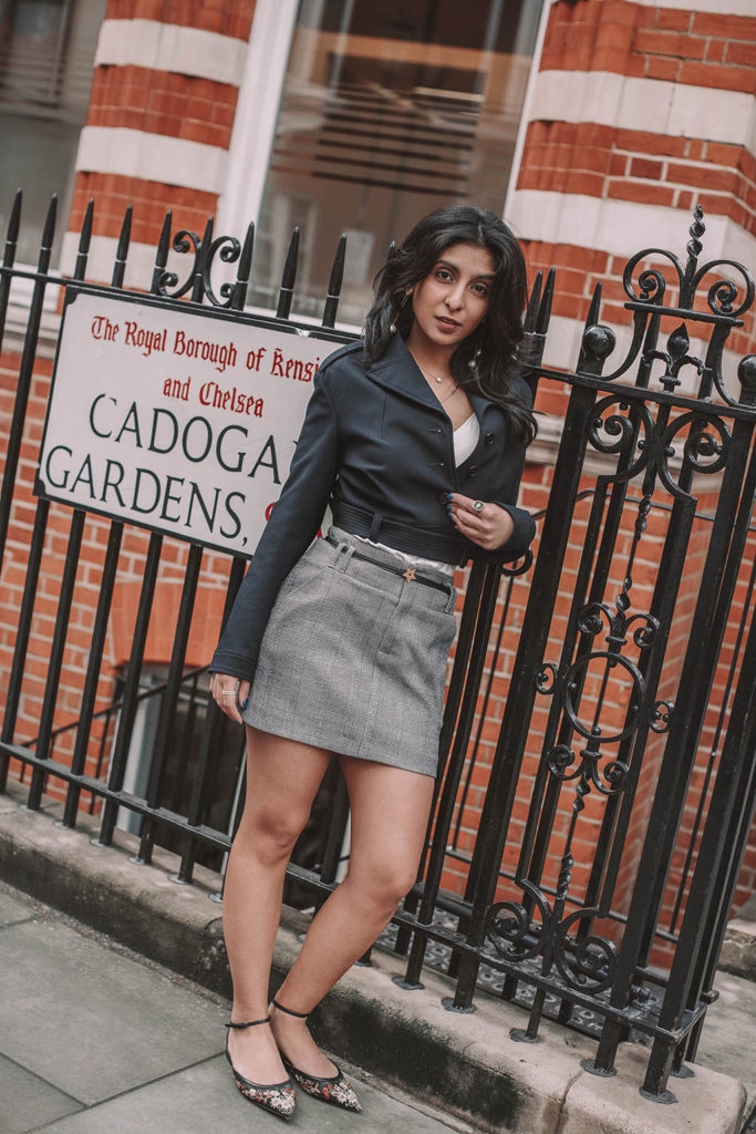 Fashion blogger Shloka Narang of The Silk Sneaker shares how to style a plaid skirt to create the perfect summer outfit featuring Maje, Zara and Dior