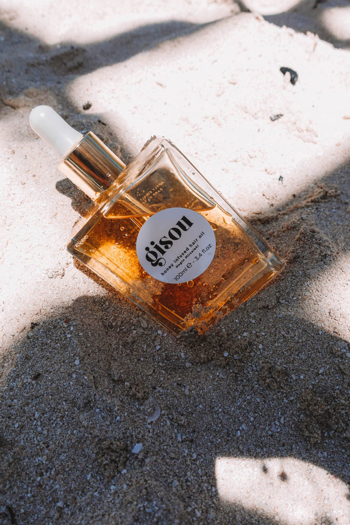 Fashion and beauty blogger Shloka Narang of The Silk Sneaker shares her best summer beauty products suited for the heat and days by the beach including Gisou and The Ouai.