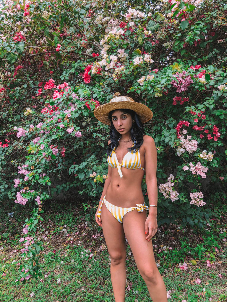 Fashion blogger Shloka Narang of The Silk Sneaker shares her picks for the best swimsuits for summer 2018 including high waisted bikinis and stylish one pieces from Zimmermann, Solid and Striped and Topshop