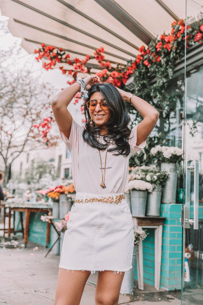 Fashion blogger Shoka Narang of The Silk Sneaker shares her secret to investing in luxury t shirts while comparing the Gucci t shirt and the Saint Laurent t shirt in a casual summer outfit featuring Saint Laurent, Dior and Topshop