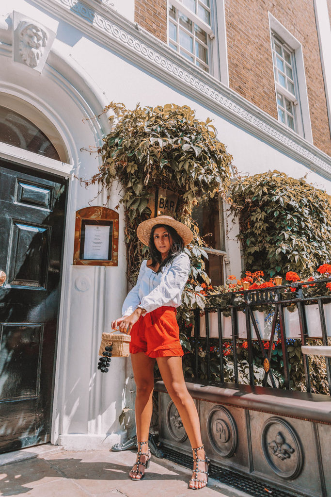Fashion blogger Shloka Narang of The Silk Sneaker shares how to style a summer 2018 top in a sweetheart neckline for a cute summer outfit featuring Zara, Valentino and Chriselle x JOA