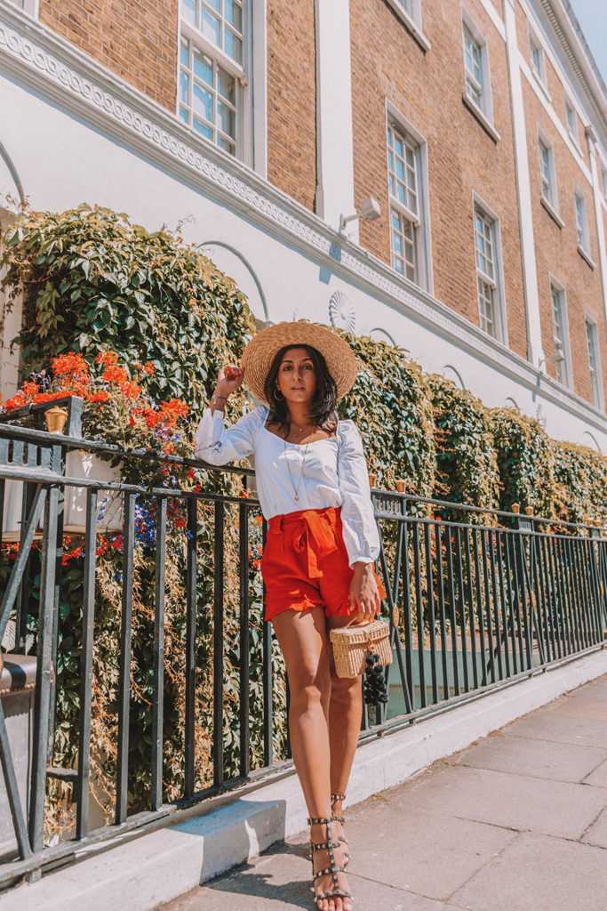 Fashion blogger Shloka Narang of The Silk Sneaker shares how to style a summer 2018 top in a sweetheart neckline for a cute summer outfit featuring Zara, Valentino and Chriselle x JOA