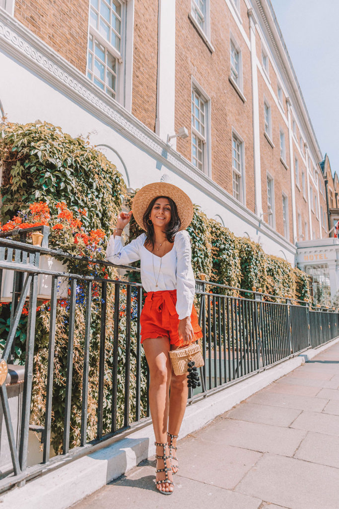 Fashion blogger Shloka Narang of The Silk Sneaker shares how to style a summer 2018 top in a sweetheart neckline for a cute summer outfit featuring Zara, Valentino and Chriselle x JOA
