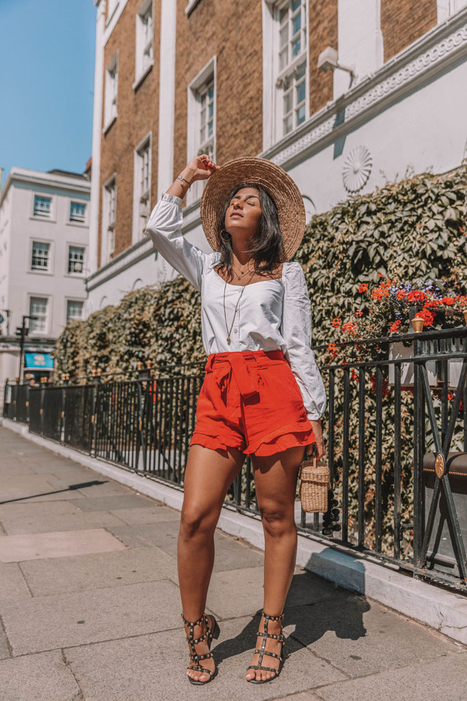 Fashion blogger Shloka Narang of The Silk Sneaker shares how to style a summer 2018 top in a sweetheart neckline for a cute summer outfit featuring Zara, Valentino and Chriselle x JOA