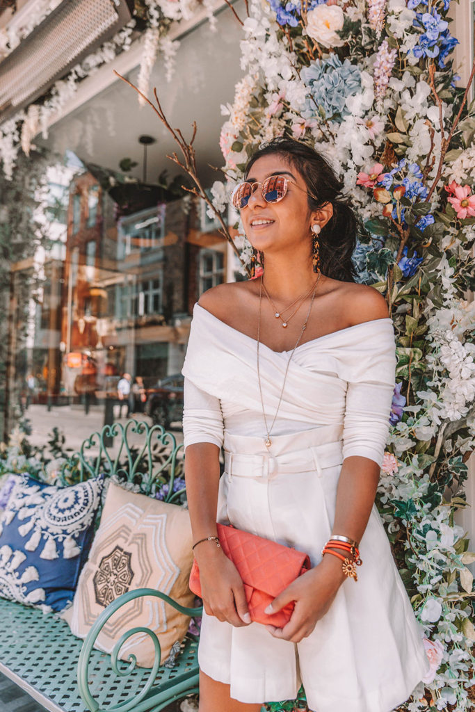 Fashion blogger Shloka Narang of The Silk Sneaker shares tips on how to wear a white monochrome summer outfit featuring Storets, Mango and Chanel