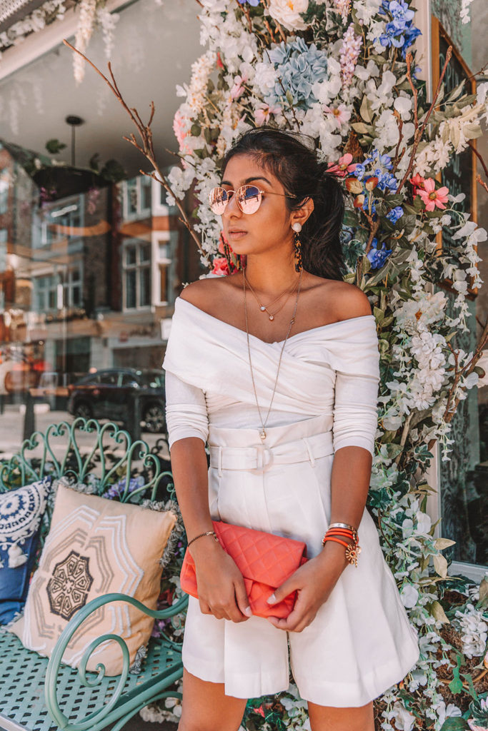 Fashion blogger Shloka Narang of The Silk Sneaker shares tips on how to wear a white monochrome summer outfit featuring Storets, Mango and Chanel