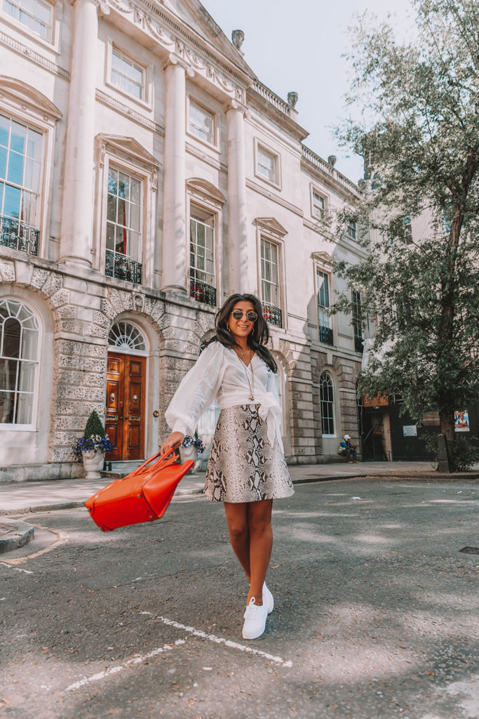 Fashion blogger Shloka Narang of The Silk Sneaker shares the summer blouse you need to create a cute summer outfit featuring ba&sh, Celine and Ray-Ban