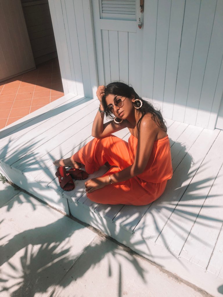 Luxury fashion blogger Shloka Narang of The Silk Sneaker shares her holiday outfit ideas for what to wear in Italy