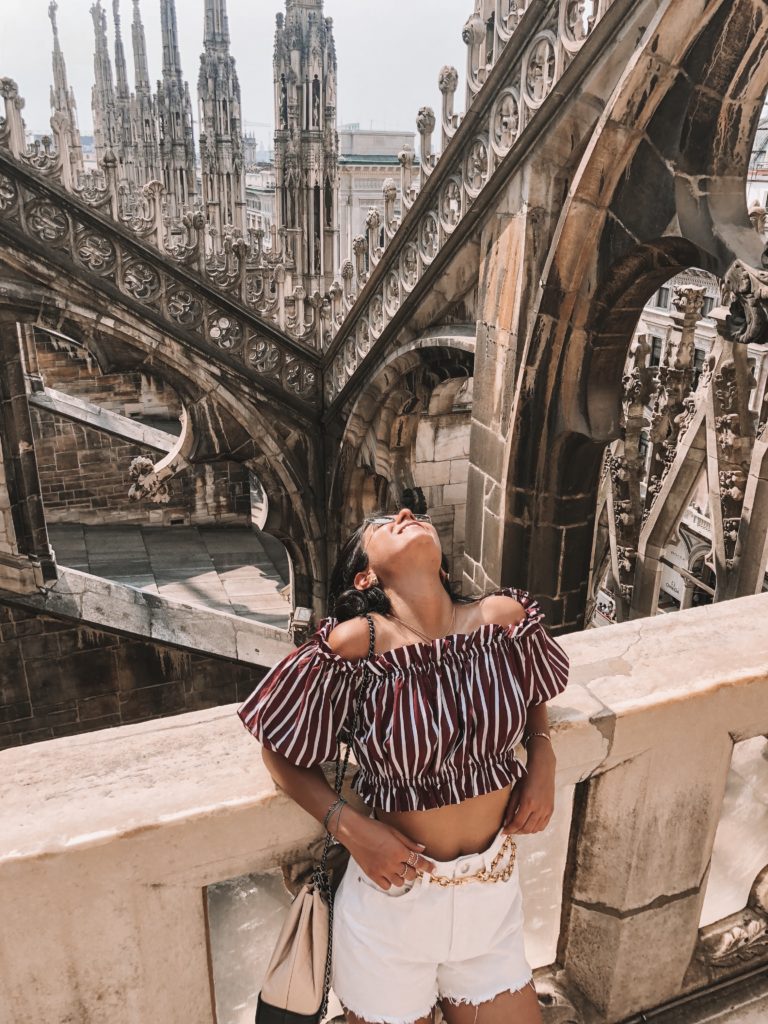 Luxury fashion blogger Shloka Narang of The Silk Sneaker shares her holiday outfit ideas for what to wear in Italy
