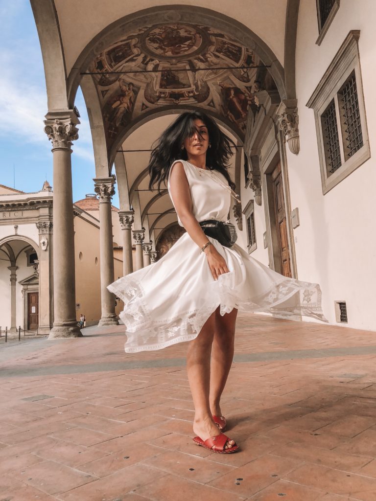 Luxury fashion blogger Shloka Narang of The Silk Sneaker shares her holiday outfit ideas for what to wear in Italy