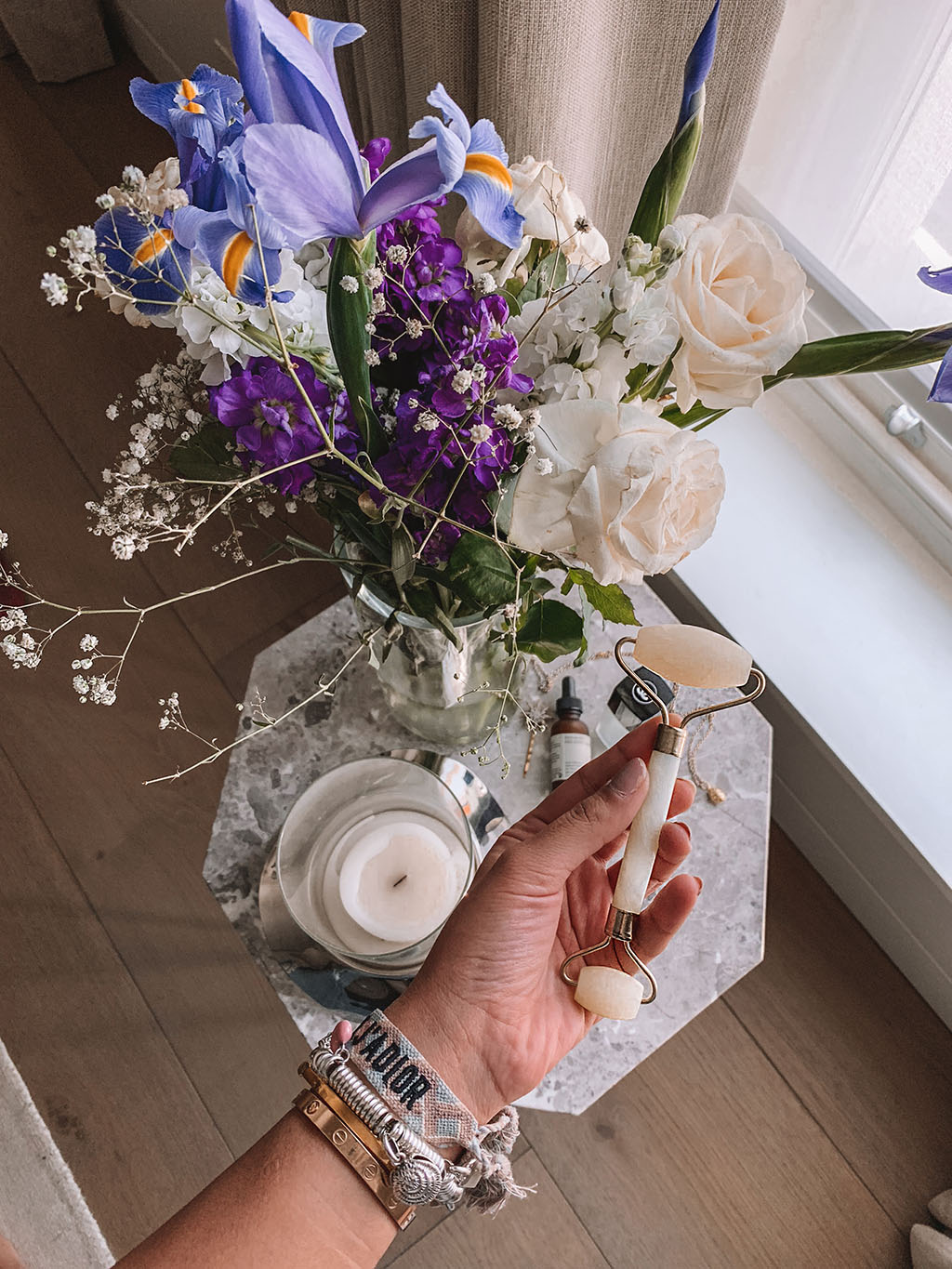 Luxury fashion and beauty blogger Shloka Narang of The Silk Sneaker shares how to use a jade roller and the benefits of crystal face rollers