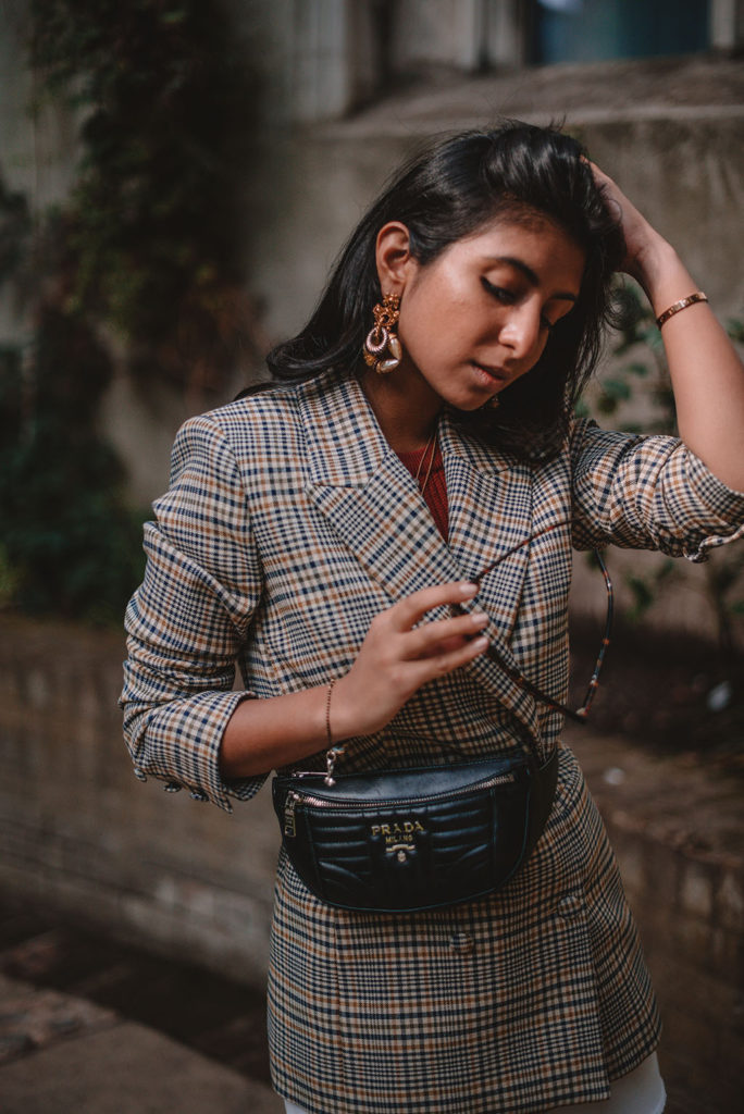 Luxury fashion blogger Shloka Narang of The Silk Sneaker shares how to create a pre fall transitional outfit featuring & Other Stories and Prada