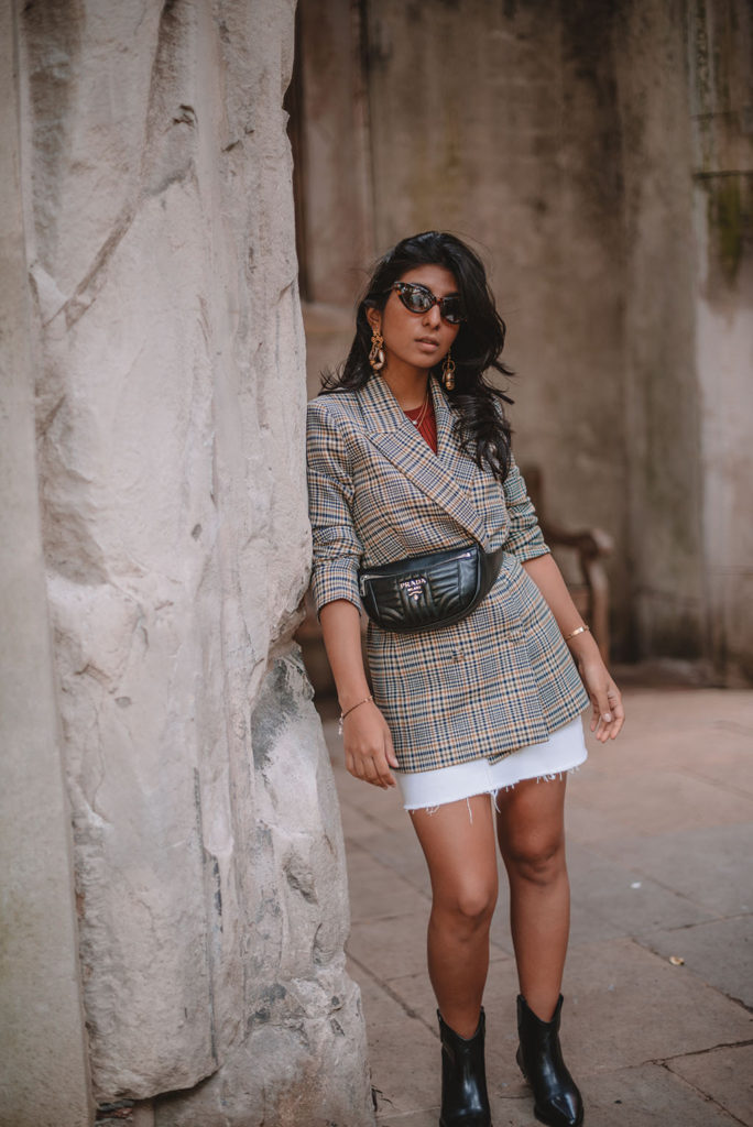 Luxury fashion blogger Shloka Narang of The Silk Sneaker shares how to create a pre fall transitional outfit featuring & Other Stories and Prada