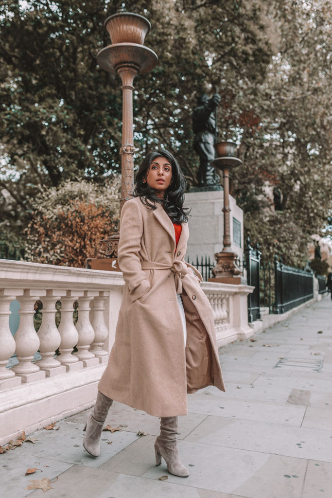 Luxury fashion blogger Shloka Narang of The Silk Sneaker shares the best winter coats on the high street and designer retailers featuring & Other Stories and Stuart Weitzman