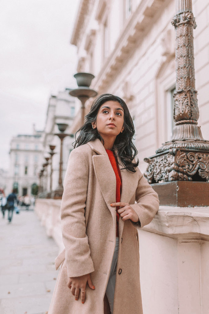 Luxury fashion blogger Shloka Narang of The Silk Sneaker shares the best winter coats on the high street and designer retailers featuring & Other Stories and Stuart Weitzman