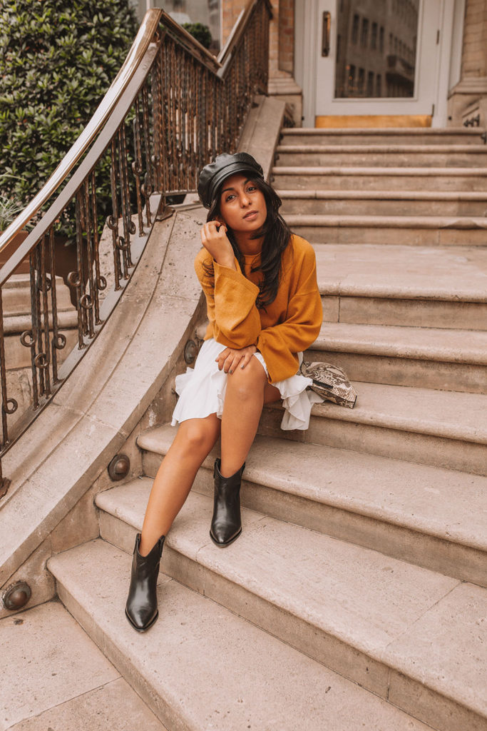 Luxury fashion blogger Shloka Narang of The Silk Sneaker shares her styling tips for a cute autumn outfit idea with cozy sweaters featuring the colour of the season; mustard yellow, in Theory, Isabel Marant and Loewe