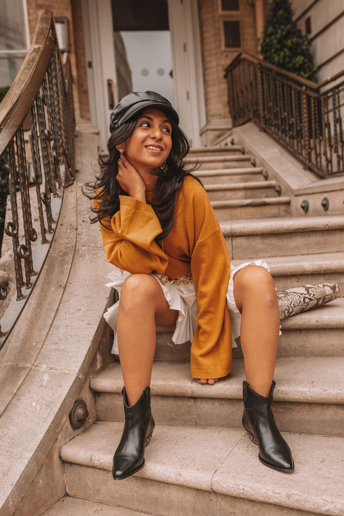 Luxury fashion blogger Shloka Narang of The Silk Sneaker shares her styling tips for a cute autumn outfit idea with cozy sweaters featuring the colour of the season; mustard yellow, in Theory, Isabel Marant and Loewe