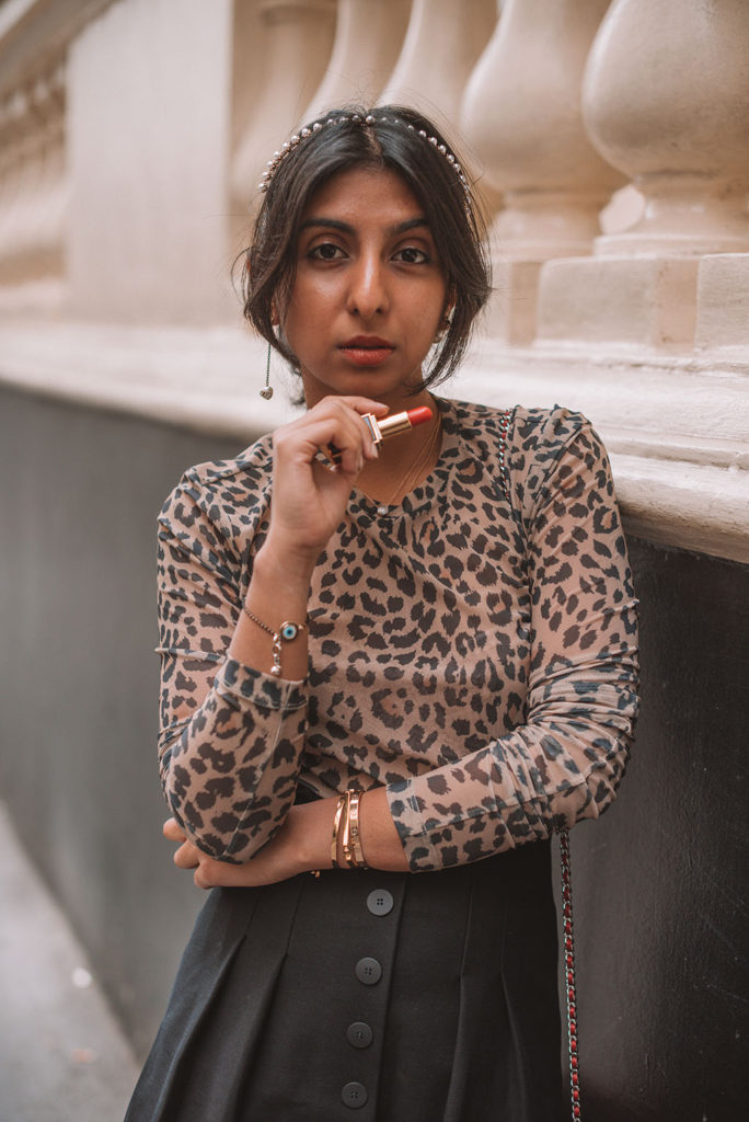Luxury fashion blogger Shloka Narang of The Silk Sneaker shares how to make a leopard print top more stylish with three special outfit tricks she learnt from fashion week