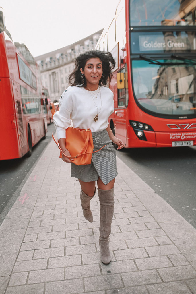 Luxury fashion blogger Shloka Narang of The Silk Sneaker shares the best over the knee boots for a casual winter outfit featuring Stuart Weitzman and Zara