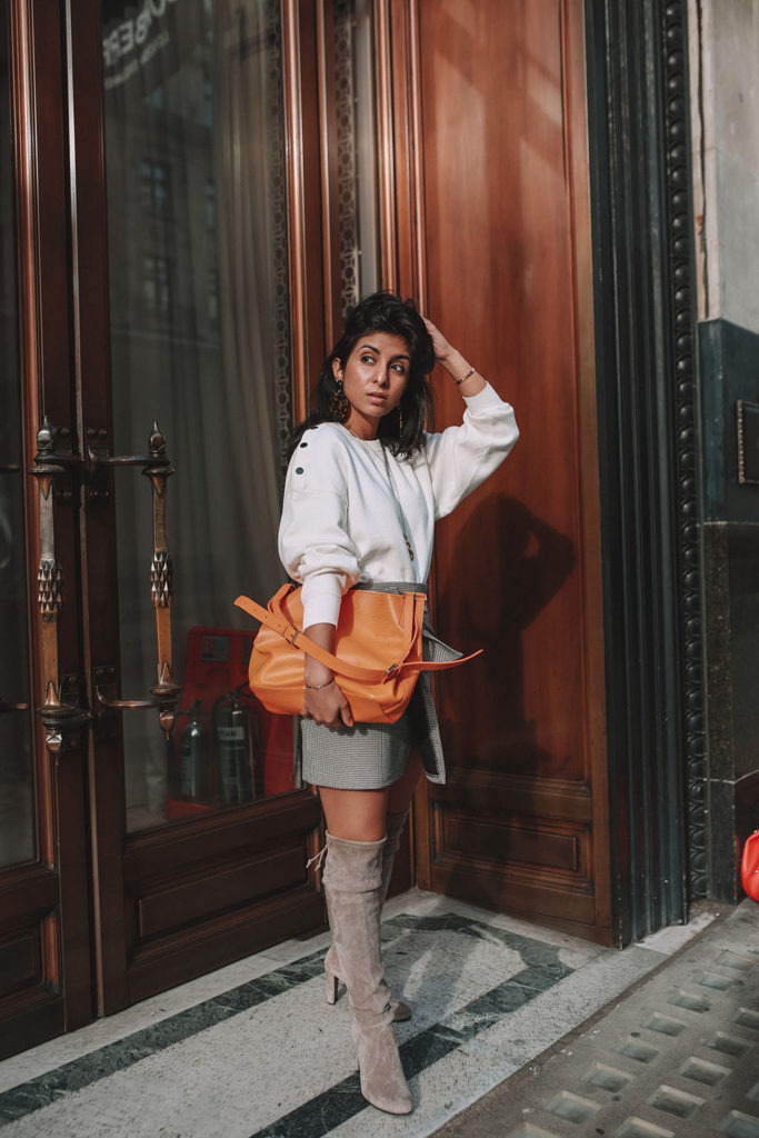 Luxury fashion blogger Shloka Narang of The Silk Sneaker shares the best over the knee boots for a casual winter outfit featuring Stuart Weitzman and Zara