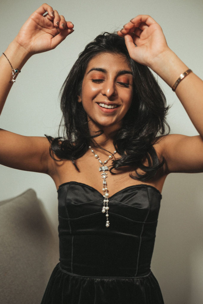 Luxury fashion and beauty blogger Shloka Narang of The Silk Sneaker shares three unique holiday party looks inspired by Chanel holiday makeup using Chanel Christmas makeup collection