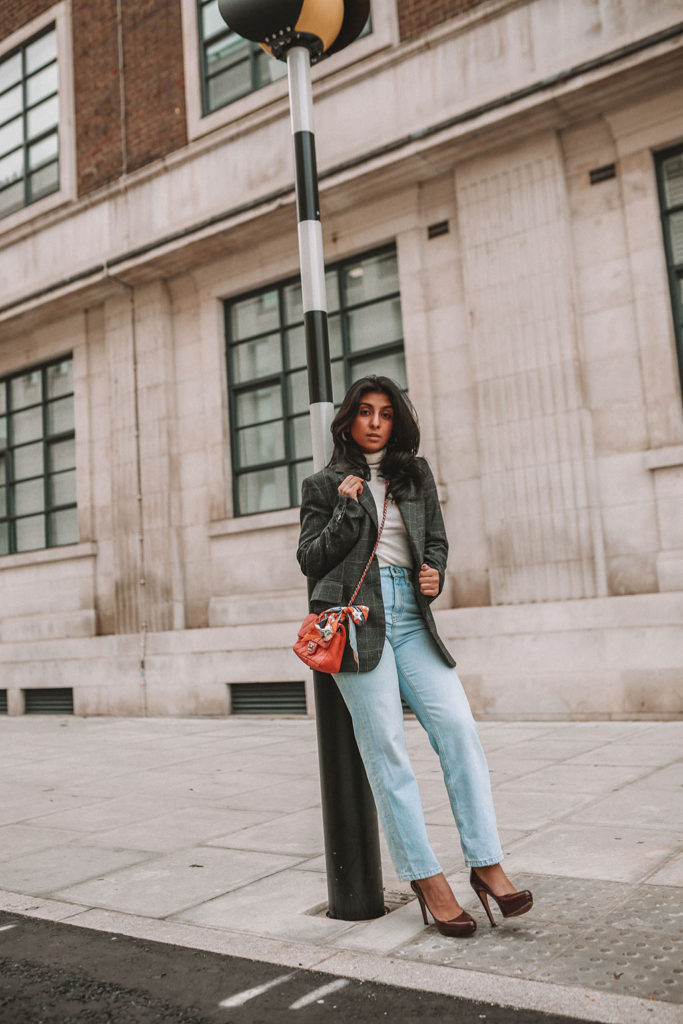 Luxury fashion blogger Shloka Narang of The Silk Sneaker shares three tips to elevate a simple winter outfit to make it more stylish featuring Chanel, Topshop and Zara