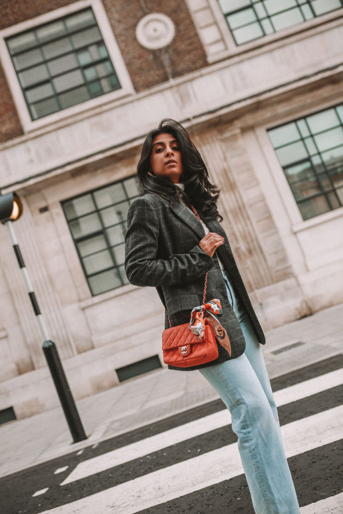 Luxury fashion blogger Shloka Narang of The Silk Sneaker shares three tips to elevate a simple winter outfit to make it more stylish featuring Chanel, Topshop and Zara