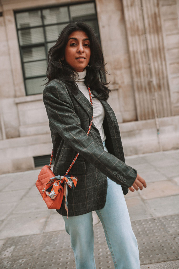 Luxury fashion blogger Shloka Narang of The Silk Sneaker shares three tips to elevate a simple winter outfit to make it more stylish featuring Chanel, Topshop and Zara