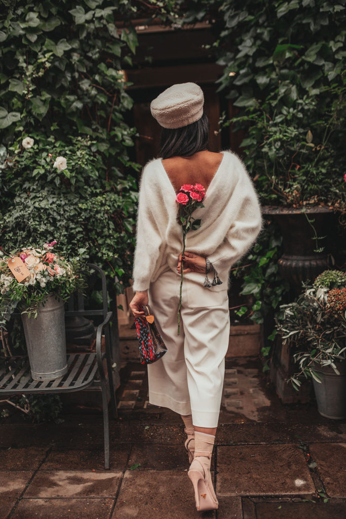 Luxury fashion blogger Shloka Narang of The Silk Sneaker shares how to wear white in winter with an all white outfit featuring Ba&sh, Louis Vuitton and Topshop