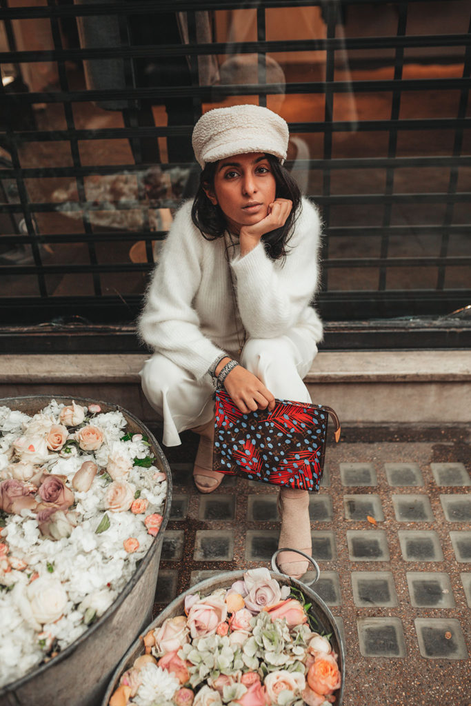 Luxury fashion blogger Shloka Narang of The Silk Sneaker shares how to wear white in winter with an all white outfit featuring Ba&sh, Louis Vuitton and Topshop
