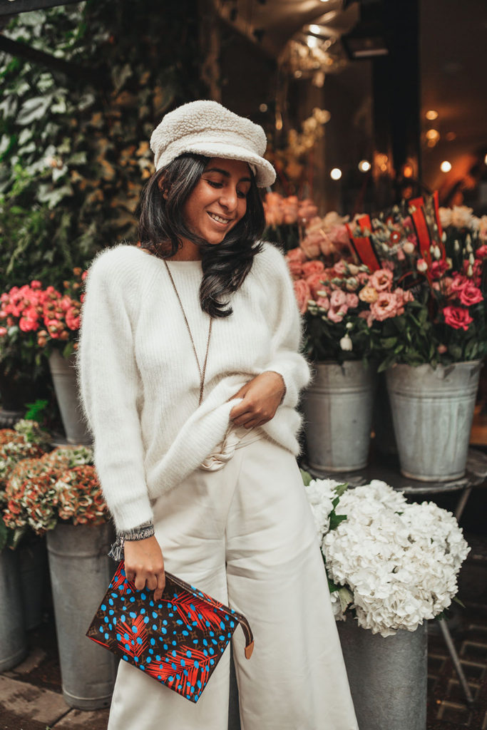 Luxury fashion blogger Shloka Narang of The Silk Sneaker shares how to wear white in winter with an all white outfit featuring Ba&sh, Louis Vuitton and Topshop