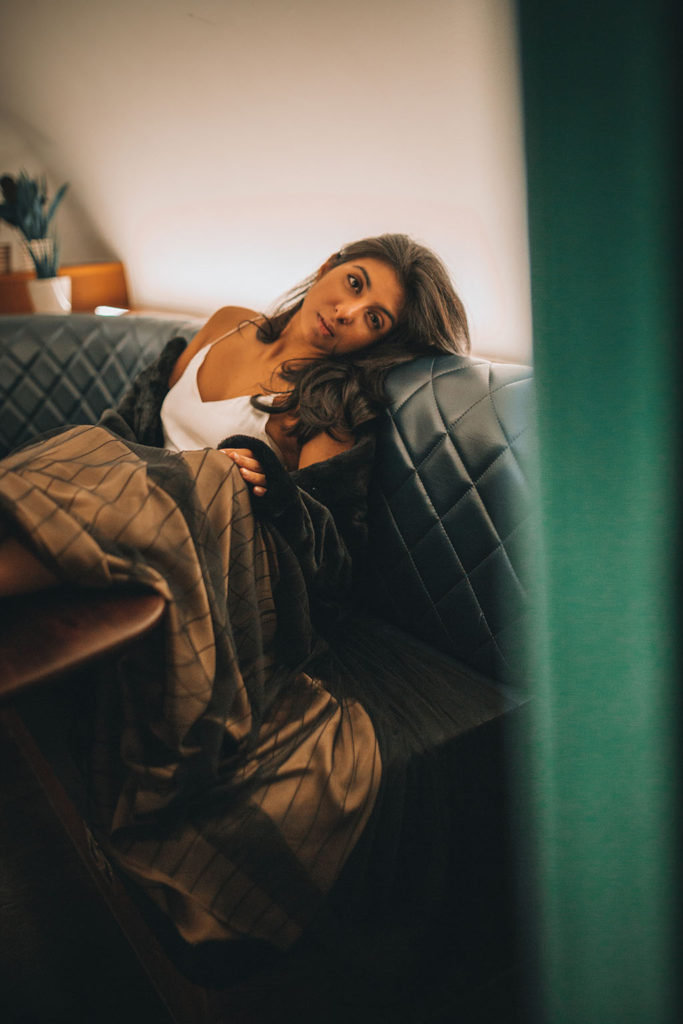 Luxury fashion blogger Shloka Narang of The Silk Sneaker shares her three top tips for creating a chic holiday party outfit to stand out from the crowd
