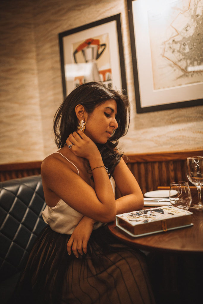 Luxury fashion blogger Shloka Narang of The Silk Sneaker shares her three top tips for creating a chic holiday party outfit to stand out from the crowd