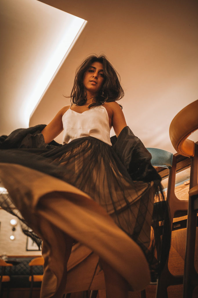 Luxury fashion blogger Shloka Narang of The Silk Sneaker shares her three top tips for creating a chic holiday party outfit to stand out from the crowd