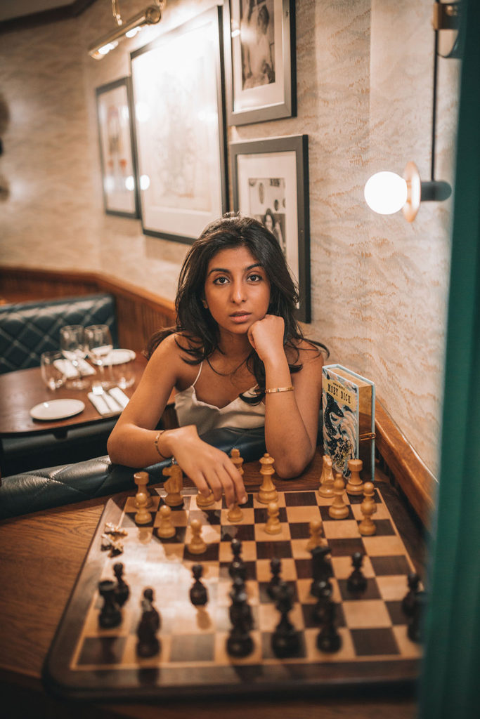 Luxury fashion blogger Shloka Narang of The Silk Sneaker shares her three top tips for creating a chic holiday party outfit to stand out from the crowd