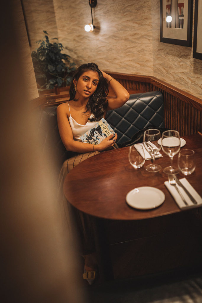 Luxury fashion blogger Shloka Narang of The Silk Sneaker shares her three top tips for creating a chic holiday party outfit to stand out from the crowd