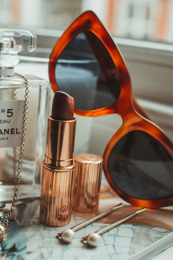 Luxury fashion and Indian beauty blogger Shloka Narang of The Silk Sneaker shares her picks for the best red lipsticks for brown skin tones and indian grils