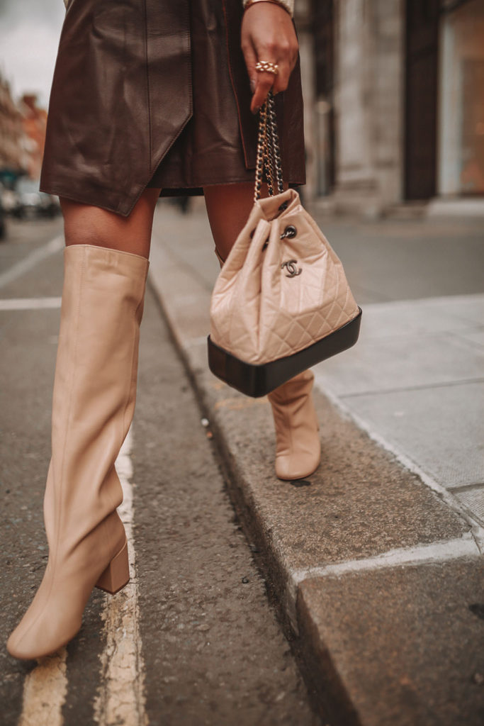 Luxury fashion blogger Shloka Narang of The Silk Sneaker shares her tips for creating a cute winter outfit while staying warm featuring & Other Stories and Chanel