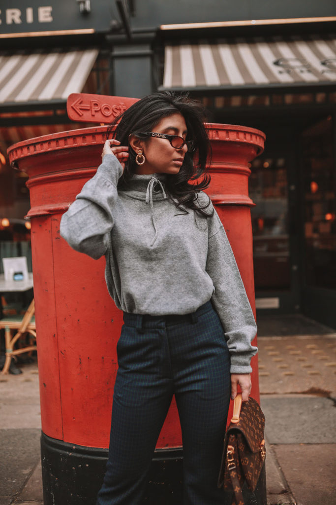 Luxury fashion blogger Shloka Narang of The Silk Sneaker shares what to wear to work in winter for stylish office outfits featuring Sandro and Louis Vuitton