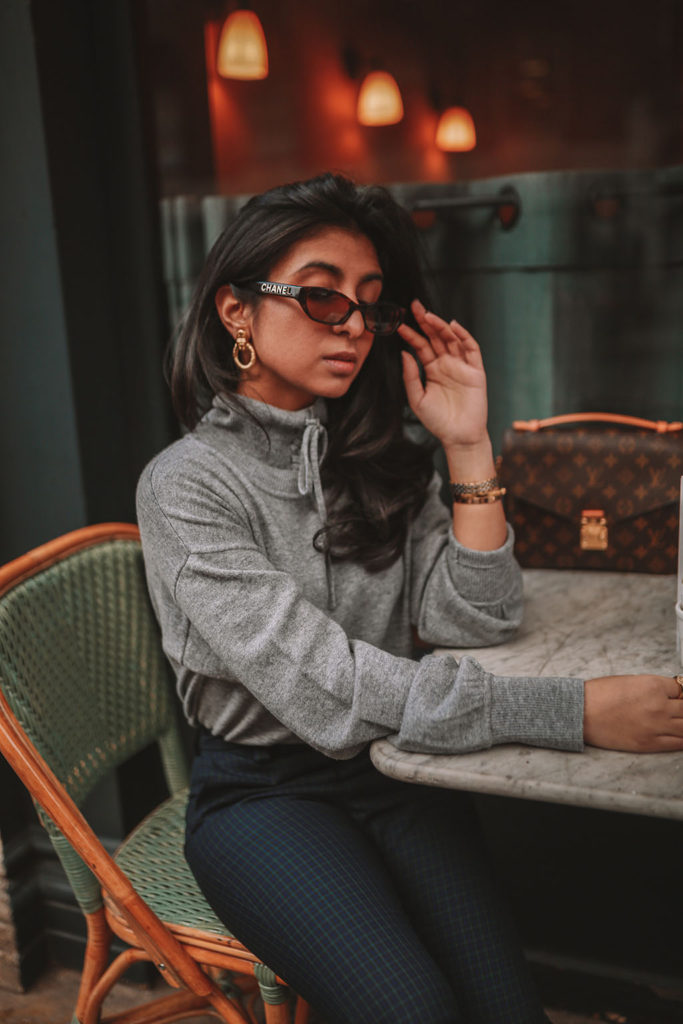 Luxury fashion blogger Shloka Narang of The Silk Sneaker shares what to wear to work in winter for stylish office outfits featuring Sandro and Louis Vuitton